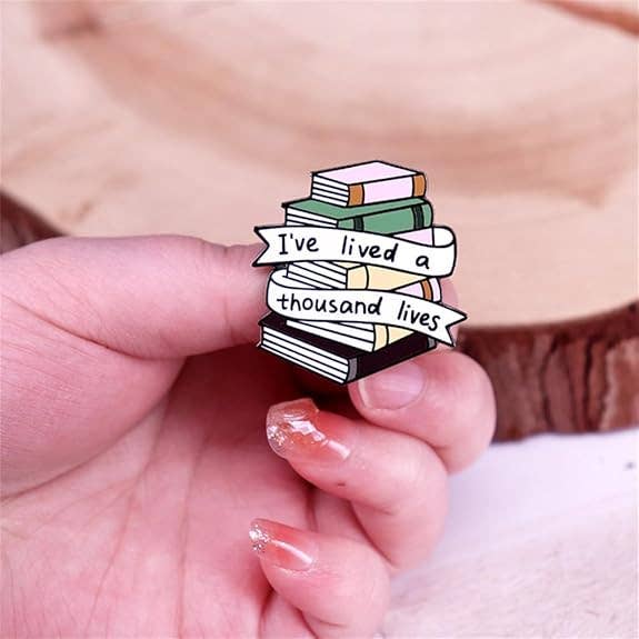 I've Lived a Thousand Lives Book Stack Enamel Pin